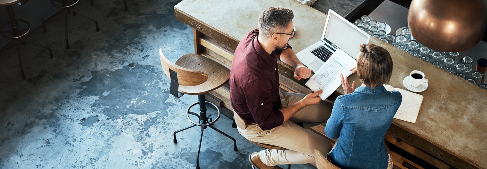 Business owner discussing business loans with a loan officer