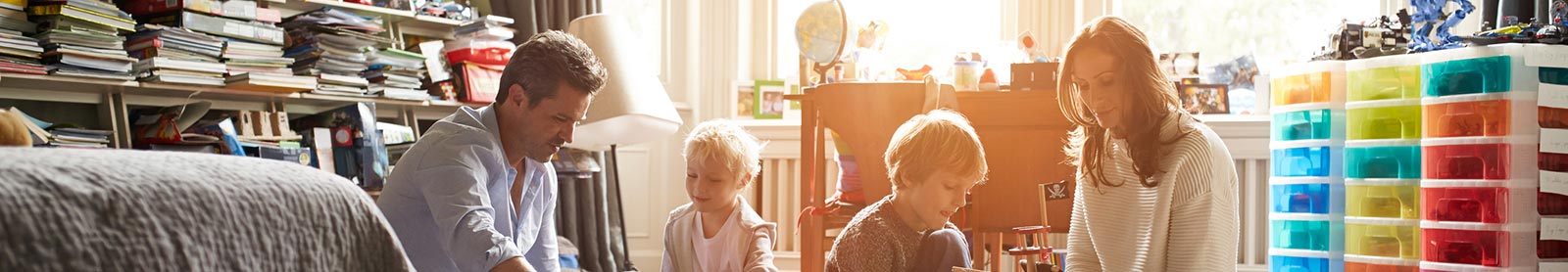 Family playing in their children's room